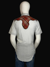 Load image into Gallery viewer, Gray shirt with plaid shoulder accents on a mannequin against a plain background