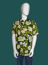 Load image into Gallery viewer, Mannequin wearing a green floral shirt against a plain background