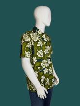 Load image into Gallery viewer, Green floral Hawaiian shirt on a mannequin against a plain background