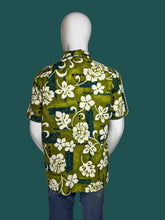 Load image into Gallery viewer, Mannequin wearing a green floral patterned shirt against a plain background