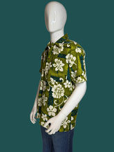 Load image into Gallery viewer, Mannequin wearing a green floral shirt against a plain background