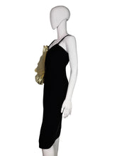 Load image into Gallery viewer, Mannequin wearing a black dress with gold accents on a plain background