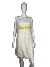 Load image into Gallery viewer, Mannequin wearing a white lace dress with a yellow belt on a plain background