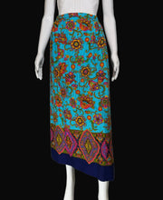 Load image into Gallery viewer, Mannequin wearing a colorful patterned skirt against a plain background