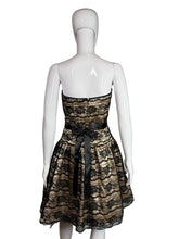 Load image into Gallery viewer, Mannequin wearing a strapless dress with black lace details on a white background