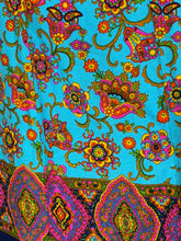 Load image into Gallery viewer, Colorful paisley pattern on a blue background