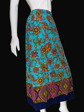 Load image into Gallery viewer, Mannequin wearing a colorful patterned skirt against a plain background