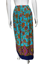 Load image into Gallery viewer, Mannequin wearing a colorful patterned skirt against a plain background