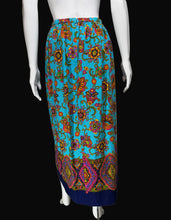 Load image into Gallery viewer, Mannequin wearing a colorful patterned skirt against a plain background
