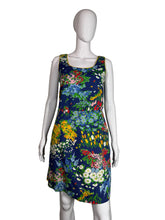 Load image into Gallery viewer, Floral-patterned garment on a mannequin against a plain background