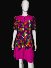 Load image into Gallery viewer, Colorful patterned dress on a mannequin against a white background