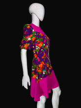 Load image into Gallery viewer, Colorful floral-patterned dress on a mannequin against a white background