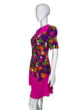 Load image into Gallery viewer, Colorful dress with floral and geometric pattern on a mannequin