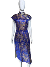 Load image into Gallery viewer, Mannequin wearing a blue dress with gold patterns on a white background