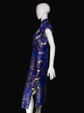 Load image into Gallery viewer, Mannequin wearing a blue dress with gold patterns on a white background