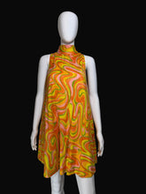 Load image into Gallery viewer, Mannequin wearing a colorful sleeveless dress with a pattern