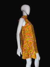 Load image into Gallery viewer, Mannequin wearing a colorful sleeveless dress with a pattern