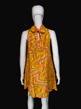 Load image into Gallery viewer, Mannequin wearing a colorful sleeveless dress with a pattern