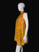 Load image into Gallery viewer, Mannequin wearing a colorful sleeveless dress with a pattern
