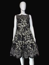 Load image into Gallery viewer, Black lace dress on a mannequin