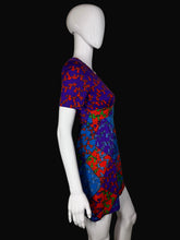 Load image into Gallery viewer, Colorful patterned dress on a mannequin
