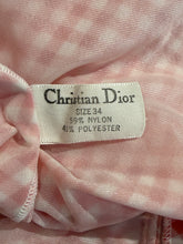 Load image into Gallery viewer, Christian Dior label on a checkered fabric background