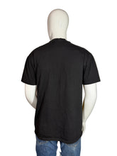 Load image into Gallery viewer, Black t-shirt with Phoenix Suns logo on a mannequin