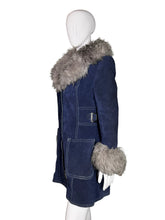 Load image into Gallery viewer, Blue jacket with gray fur trim on a mannequin against a white wall.