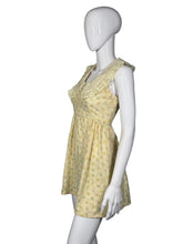 Load image into Gallery viewer, Yellow floral dress on a mannequin