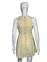 Load image into Gallery viewer, Yellow floral dress on a mannequin