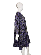 Load image into Gallery viewer, Mannequin wearing a purple paisley patterned dress
