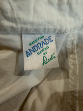 Load image into Gallery viewer, Fabric tag on a beige fabric background