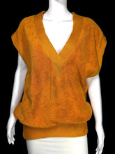 Load image into Gallery viewer, Orange sleeveless sweater on a white mannequin