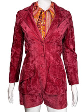 Load image into Gallery viewer, Red textured jacket on a mannequin against a plain wall.