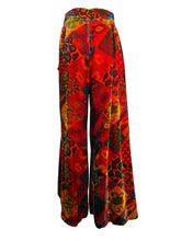 Load image into Gallery viewer, Colorful patterned pants on a mannequin against a white background