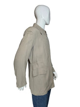Load image into Gallery viewer, A beige long-sleeve jacket displayed on a white mannequin torso