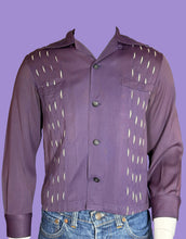 Load image into Gallery viewer, Purple shirt with cut-out design on a mannequin against a neutral background