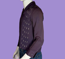 Load image into Gallery viewer, Mannequin wearing a purple shirt with cut-out patterns