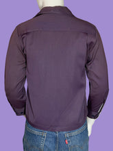 Load image into Gallery viewer, Purple shirt on a mannequin with jeans underneath against a white background