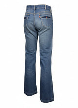 Load image into Gallery viewer, Blue jeans against a white background.