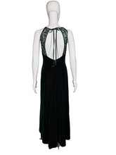 Load image into Gallery viewer, Dark green evening gown on a mannequin against a plain background