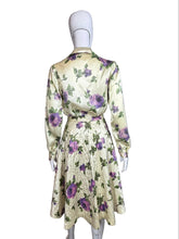 Load image into Gallery viewer, Floral dress on a mannequin against a plain background