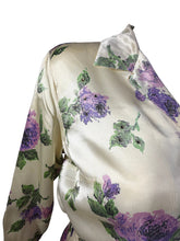 Load image into Gallery viewer, Floral patterned fabric with purple flowers and green leaves on a white background