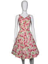 Load image into Gallery viewer, Floral dress on a mannequin against a neutral background