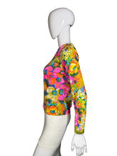 Load image into Gallery viewer, Colorful floral-patterned top on a mannequin against a neutral background
