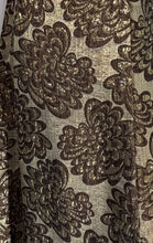Load image into Gallery viewer, A close-up of a metallic woven textile pattern featuring large taupe-brown floral shapes.