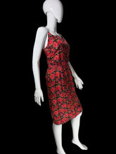 Load image into Gallery viewer, A sleeveless red and black floral dress displayed on a white mannequin.