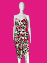 Load image into Gallery viewer, A strapless asymmetrical dress with a mixed animal print and floral pattern, displayed on a white mannequin.