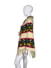 Load image into Gallery viewer, Colorful knitted poncho with patterns on a mannequin against a white background