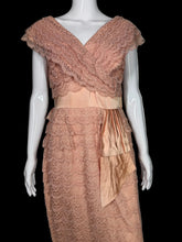 Load image into Gallery viewer, Mannequin wearing a vintage dress with textured fabric on a plain background